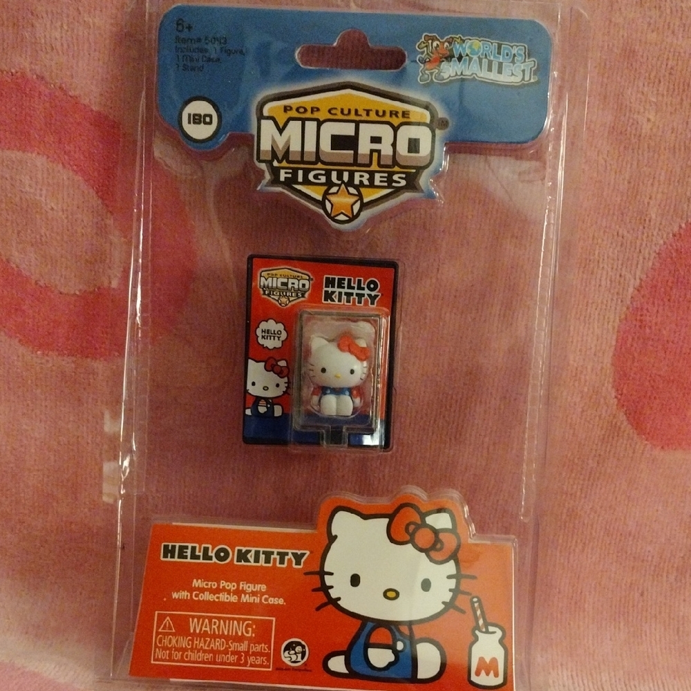 Hello Kitty World's Smallest Micro Pop Figure with Milk Bottle And Case